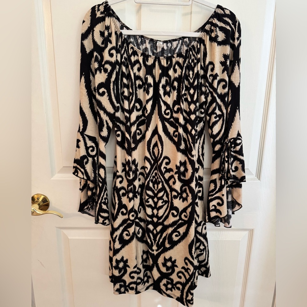 Set of two swing dresses in black and tan pattern